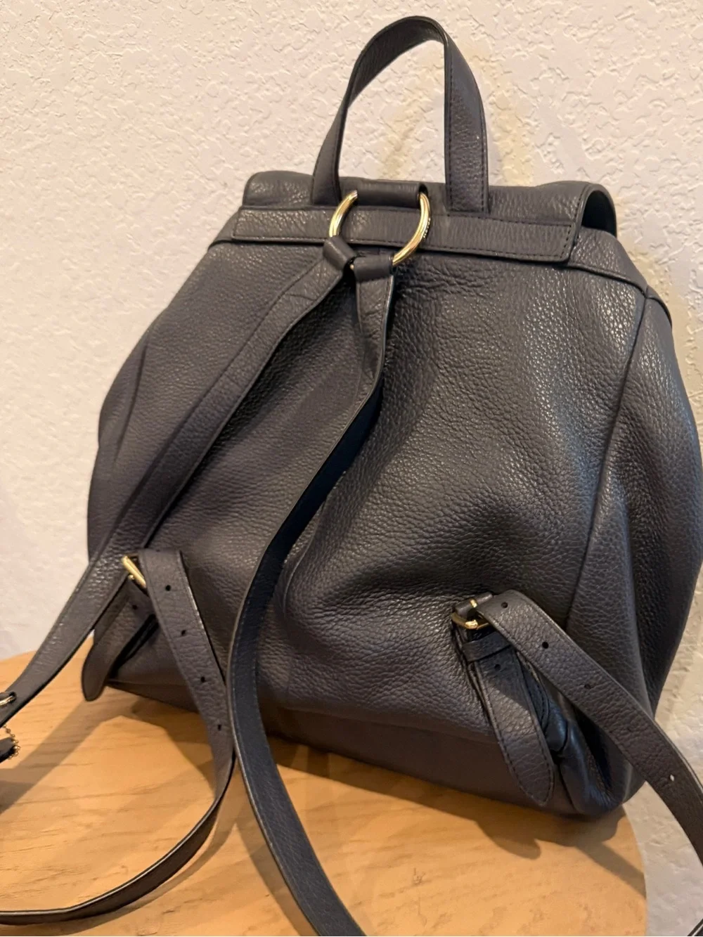 COACH Black Pebbled Leather Drawstring Backpack with Front Pockets